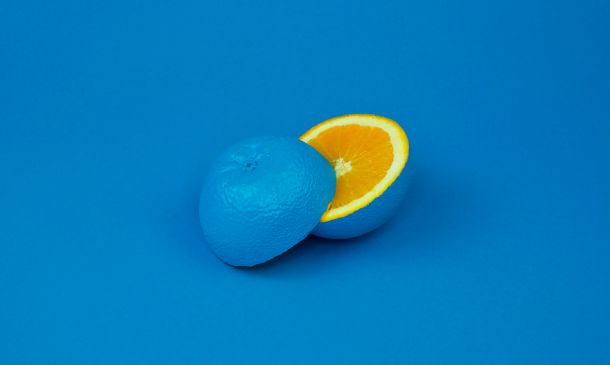 An cut open orange is blue on the outside and orange inside showing it can be different like good course design